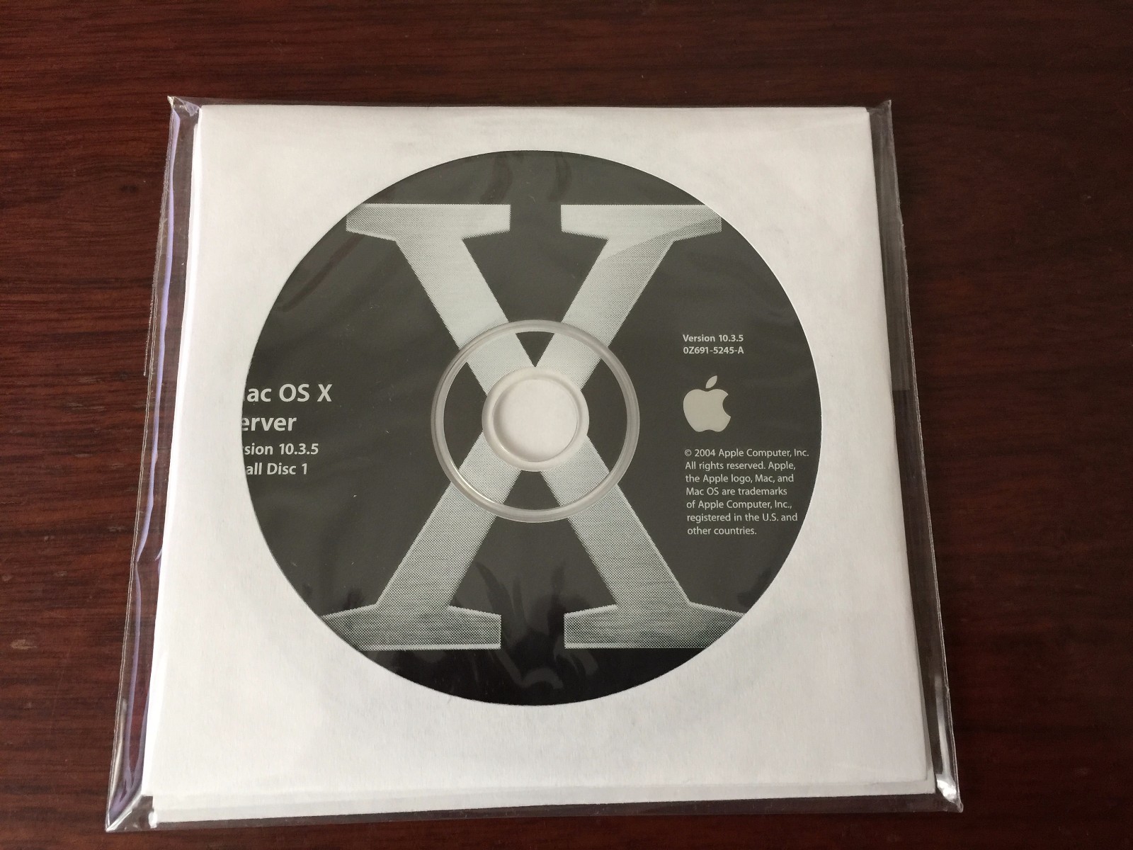 Apple Mac OS X Server 10.3 with unlimited clients key, Original 4 CD set w/Docs