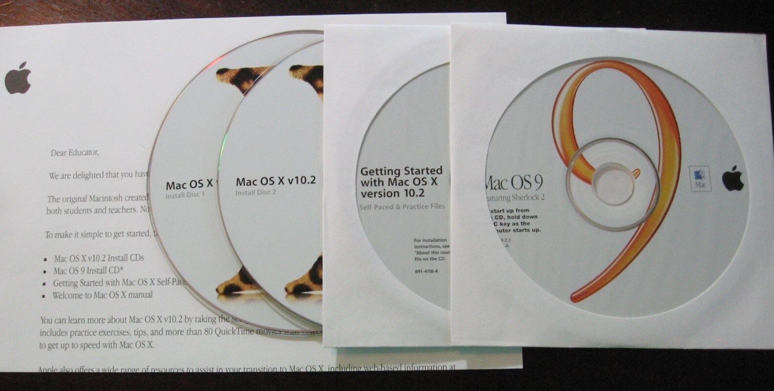 Mac OS X v10.2 Jaguar Bundle Install discs and Instruction booklet FREE SHIPPING