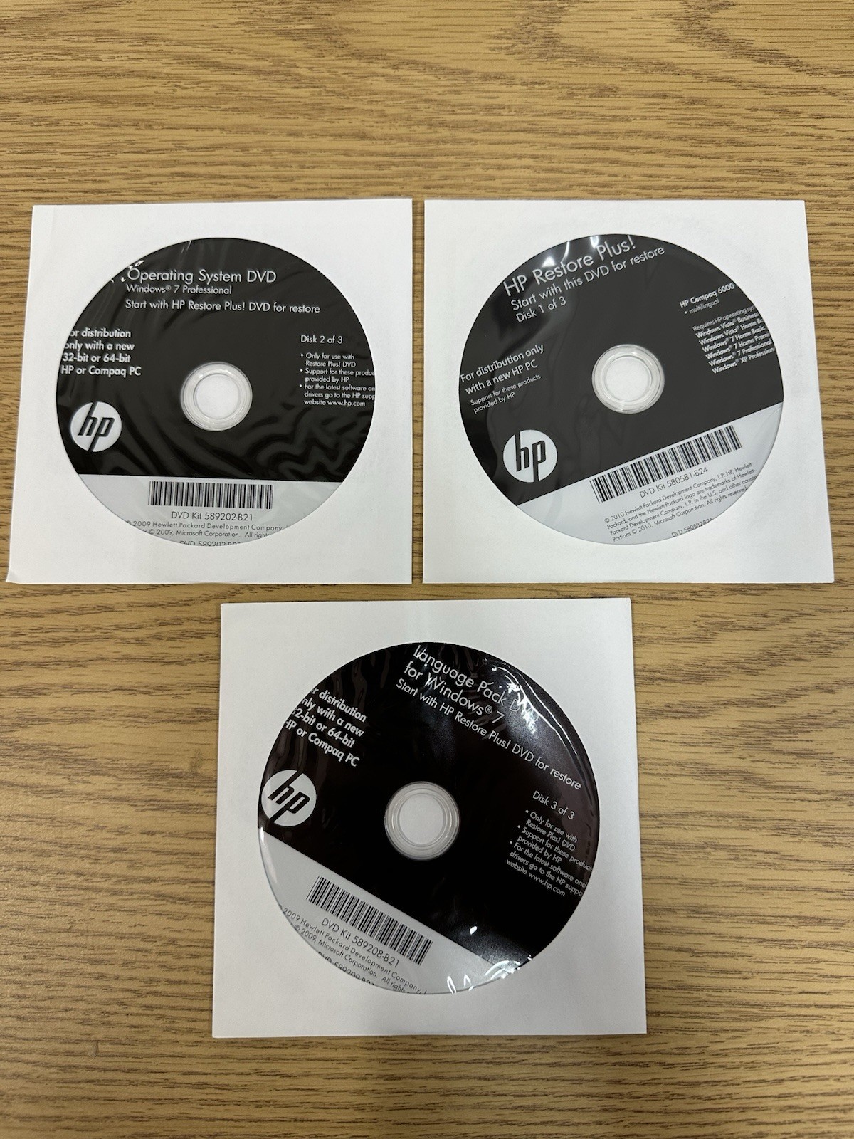 HP Restore Plus! Microsoft Windows 7 Professional Recovery DVD’S (3)