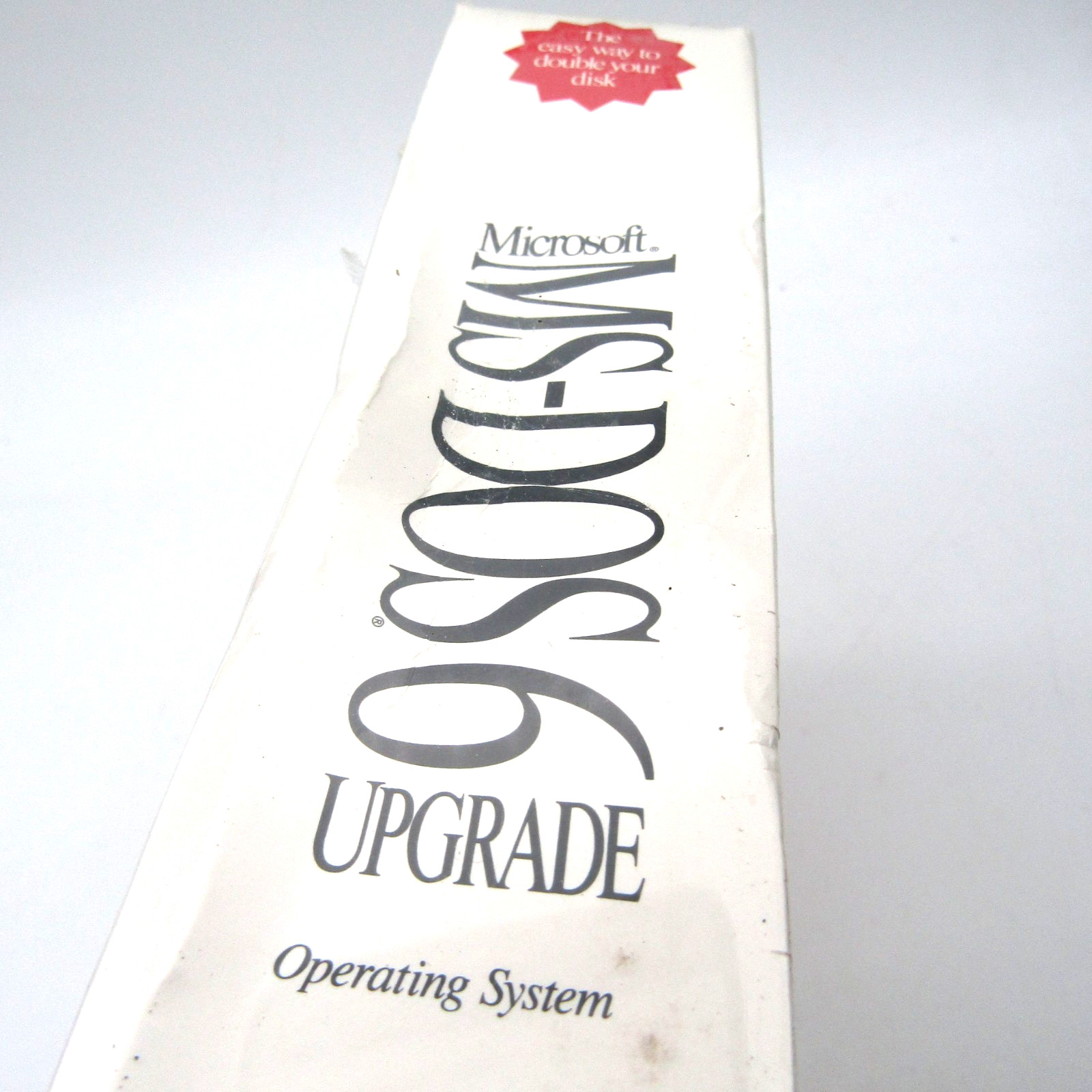 SEALED Microsoft MS DOS 6 Upgrade 5.25″ Floppy with Creases and a Rip in Wrap
