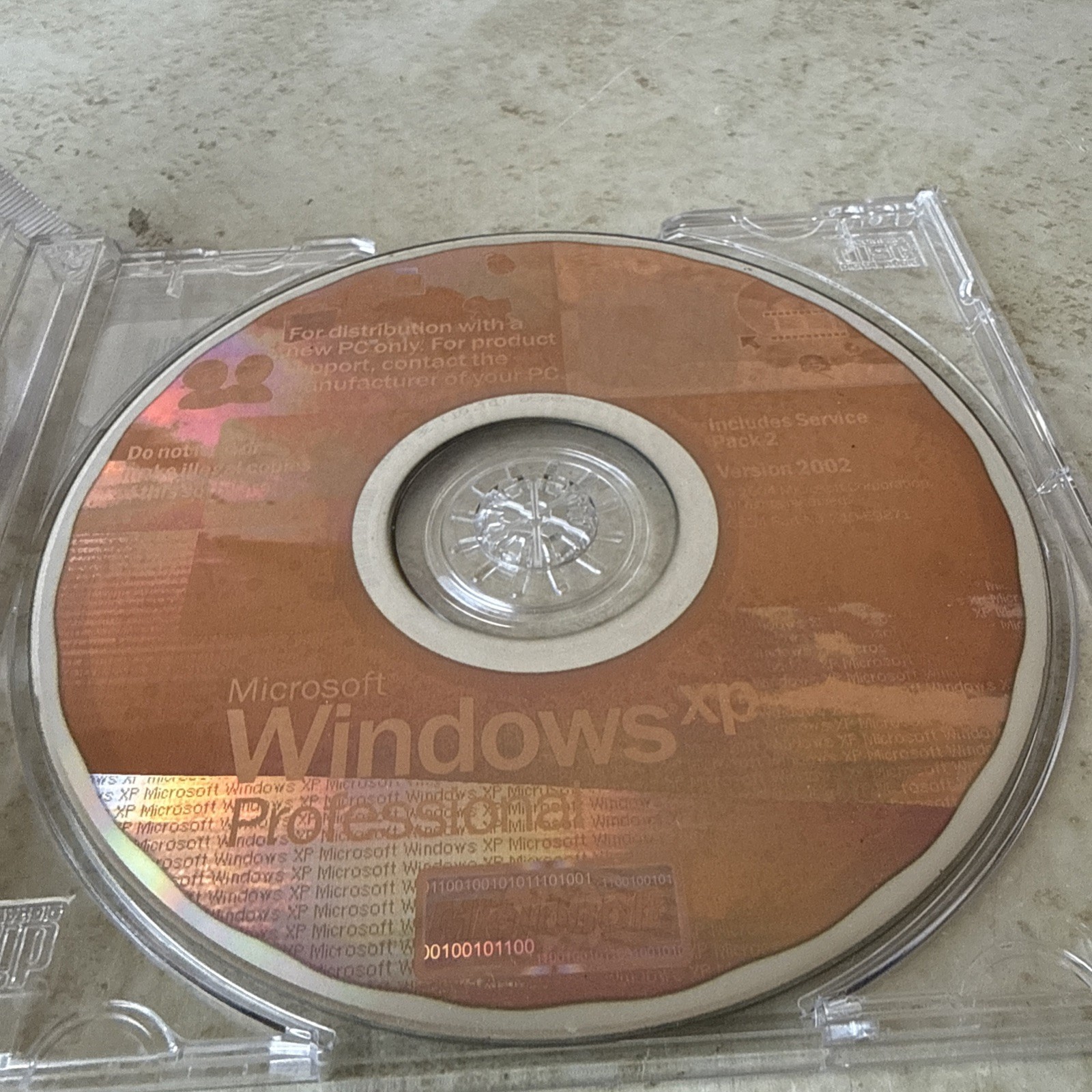 WINDOWS XP PROFESSIONAL 2002 INCLUDES SERVICE PACK 2. (NO CD PRODUCT KEY)