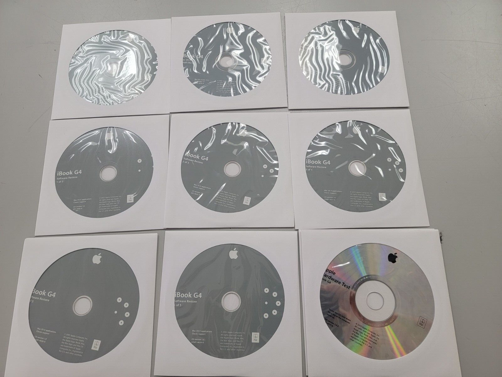 iBook G4 Mac OS X Install Disk 1-3 & iBook G4 Software Restore 1-5