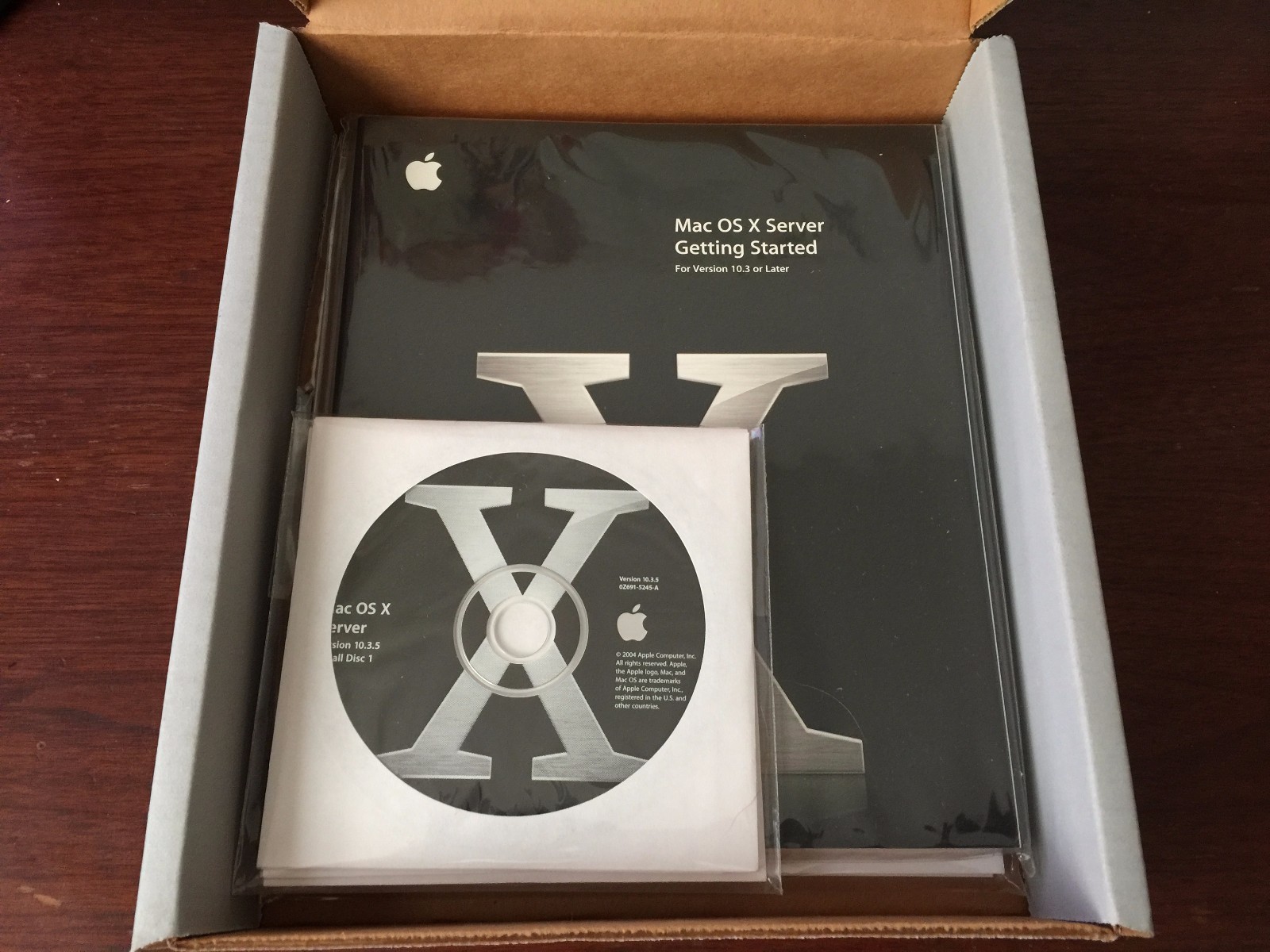 Apple Mac OS X Server 10.3 with unlimited clients key, Original 4 CD set w/Docs