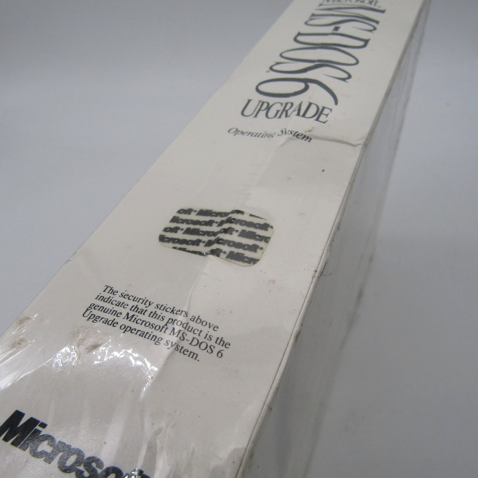 SEALED Microsoft MS DOS 6 Upgrade 5.25″ Floppy with Creases and a Rip in Wrap