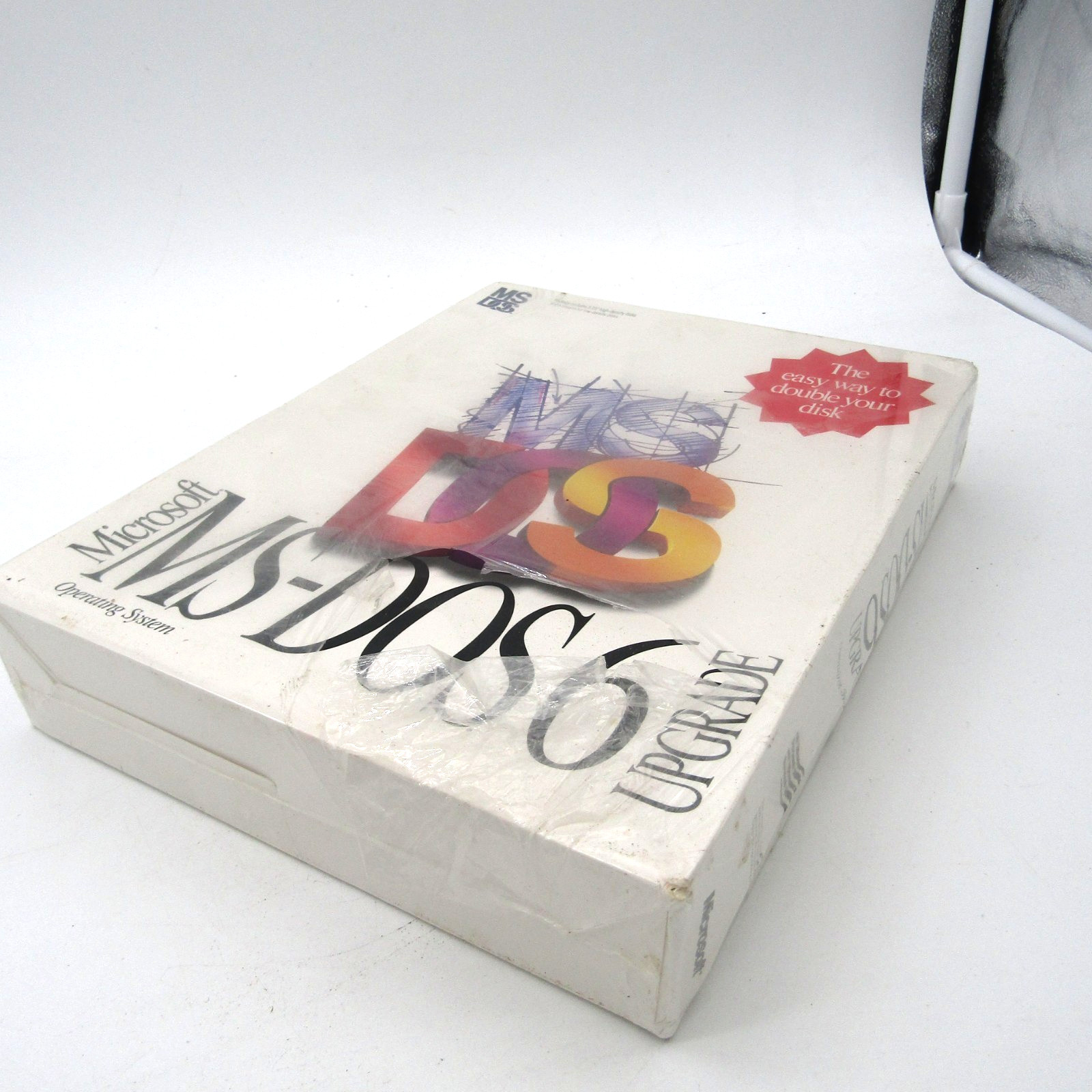 SEALED Microsoft MS DOS 6 Upgrade 5.25″ Floppy with Creases and a Rip in Wrap