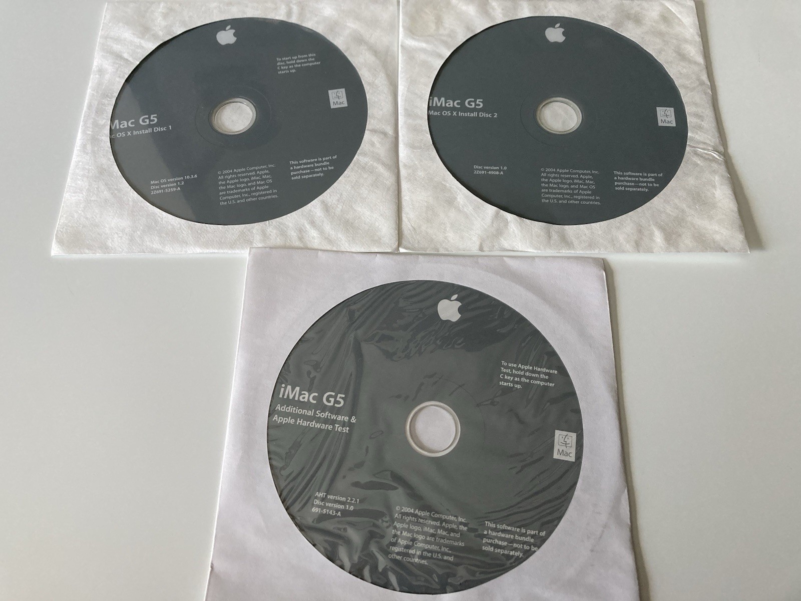 Mac OS X 10.3.6 Install DVDs + Apple Hardware Test DVD for iMac G5 (2004)