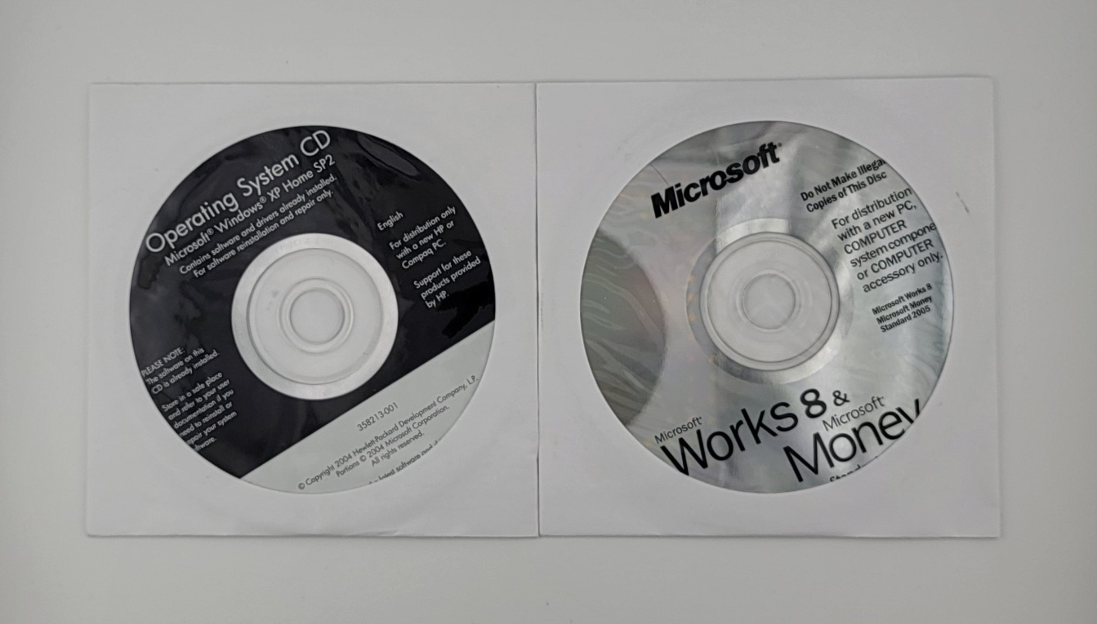 Windows XP SP2 CD – Microsoft Works – Windvd Creator & Home Theater – Cake Cd