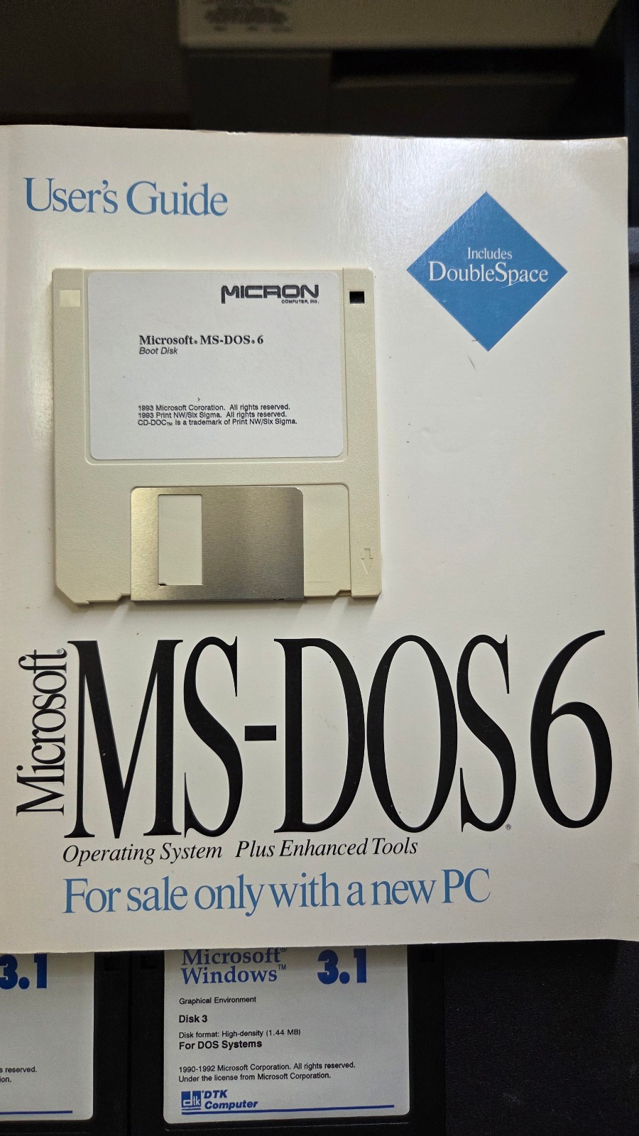 windows 3.1 floppy. DOS 6 boot disk and manuals