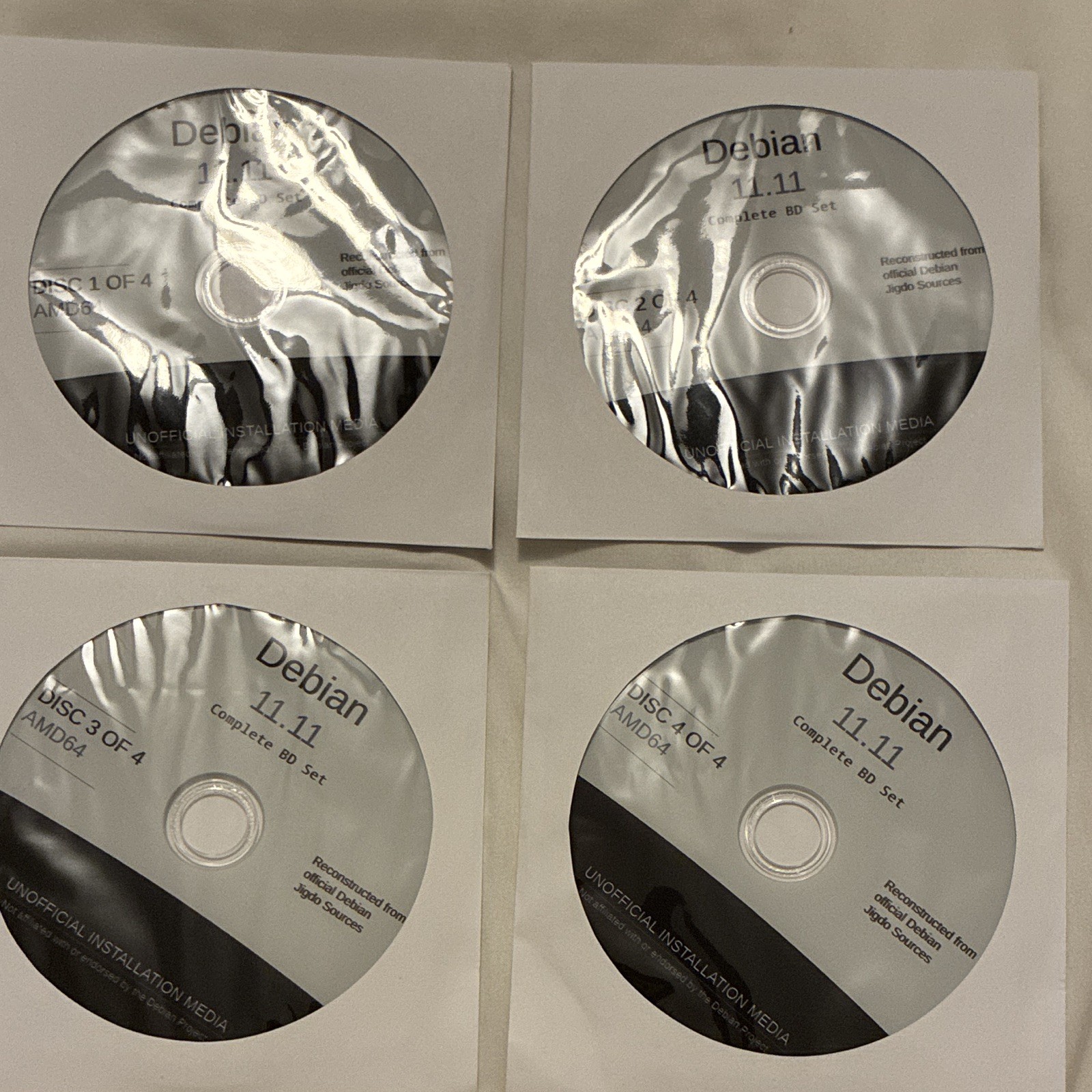 Debian 11.11 Linux AMD64 Complete BD Installation Media 4-Disc Set