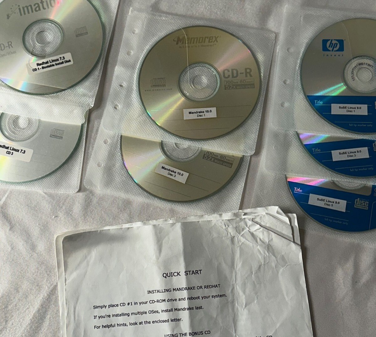 LOT of Three Linux OS – Redhat Linux 7.3 – Mandrake 10.0 – SuSE Linux 9.0 – CDR