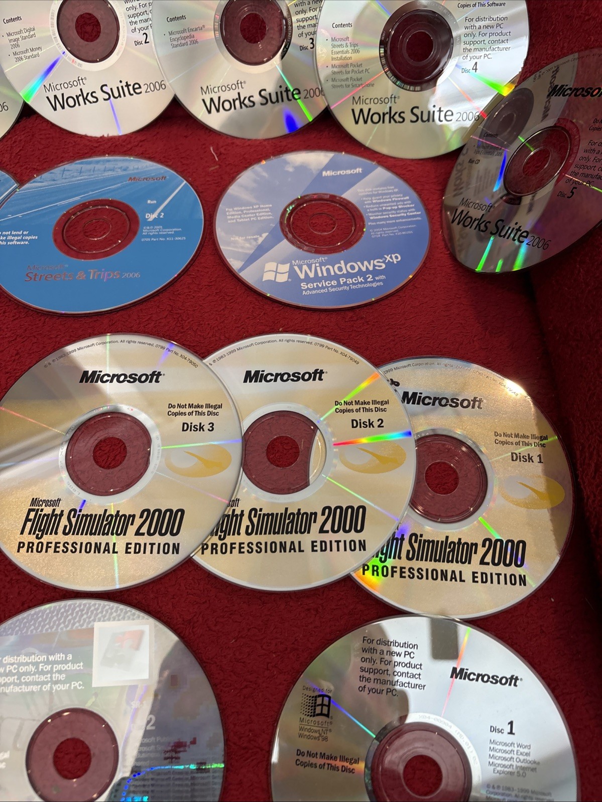 Lot Of 20 Vintage Microsoft Software CDs Office Flight Simulator Works XP Trips