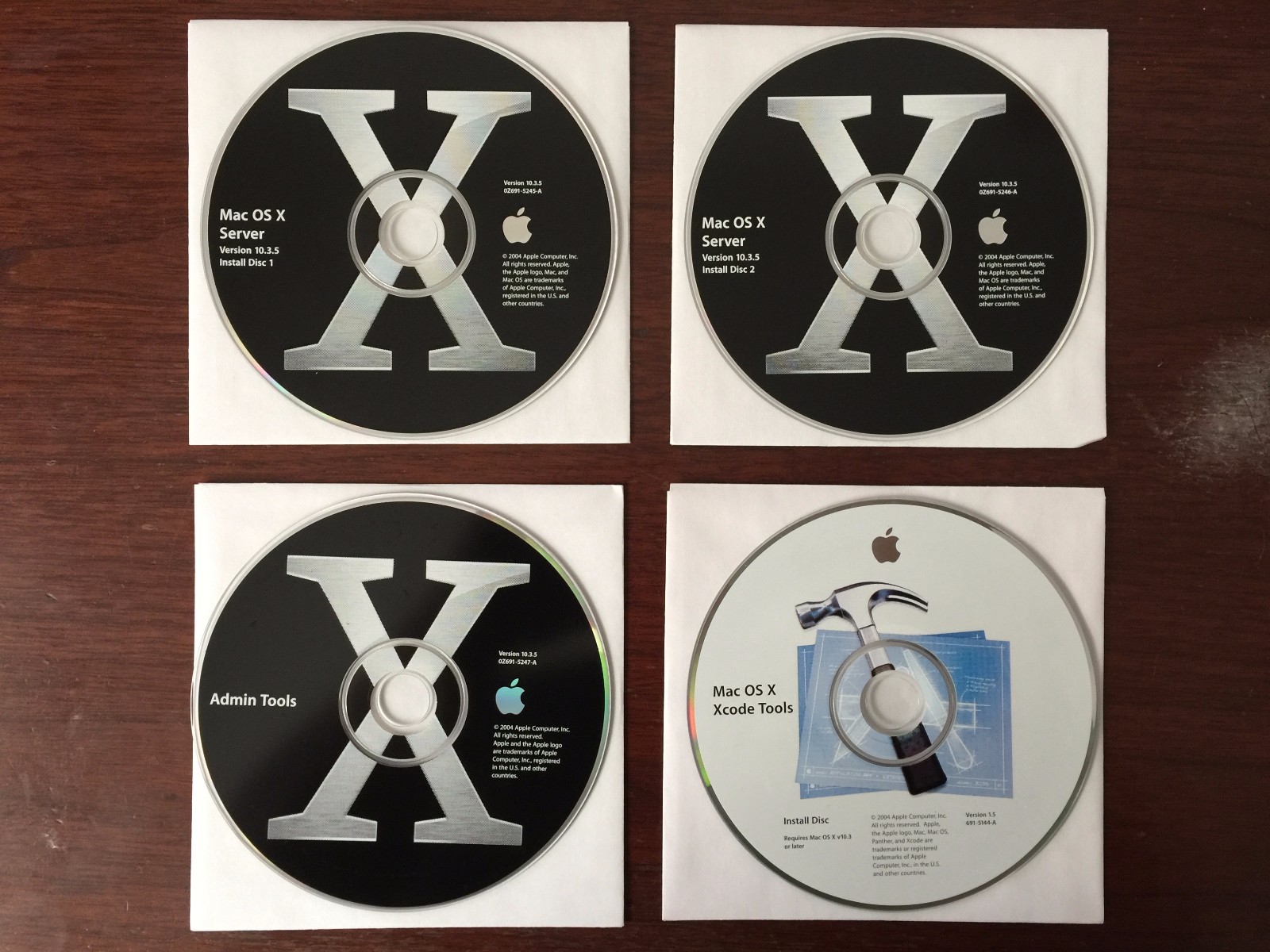 Apple Mac OS X Server 10.3 with unlimited clients key, Original 4 CD set w/Docs